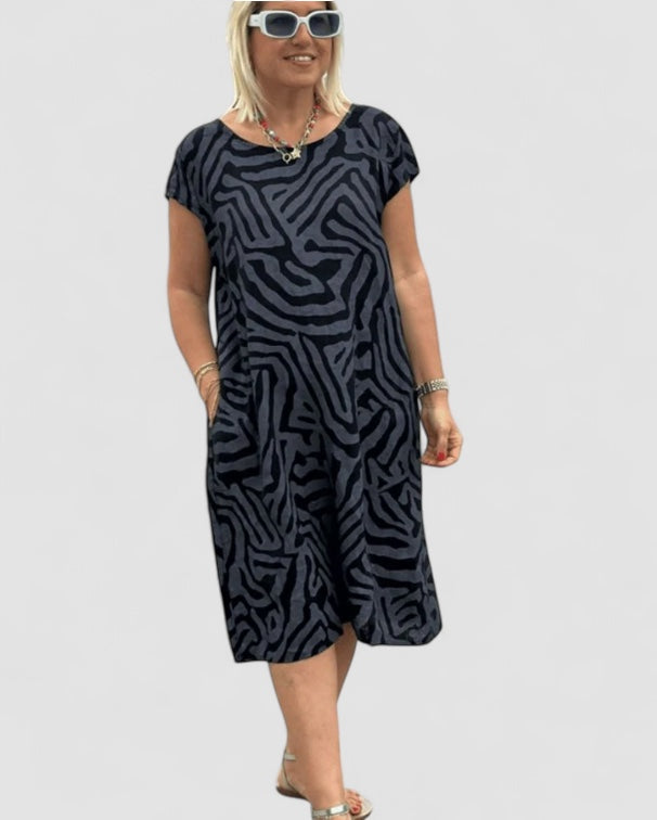 Fanny™ – Airy zebra-patterned summer dress with pockets