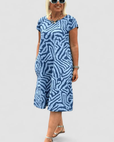 Fanny™ – Airy zebra-patterned summer dress with pockets